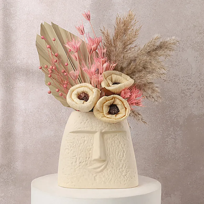 Face Vase with Dried Flowers